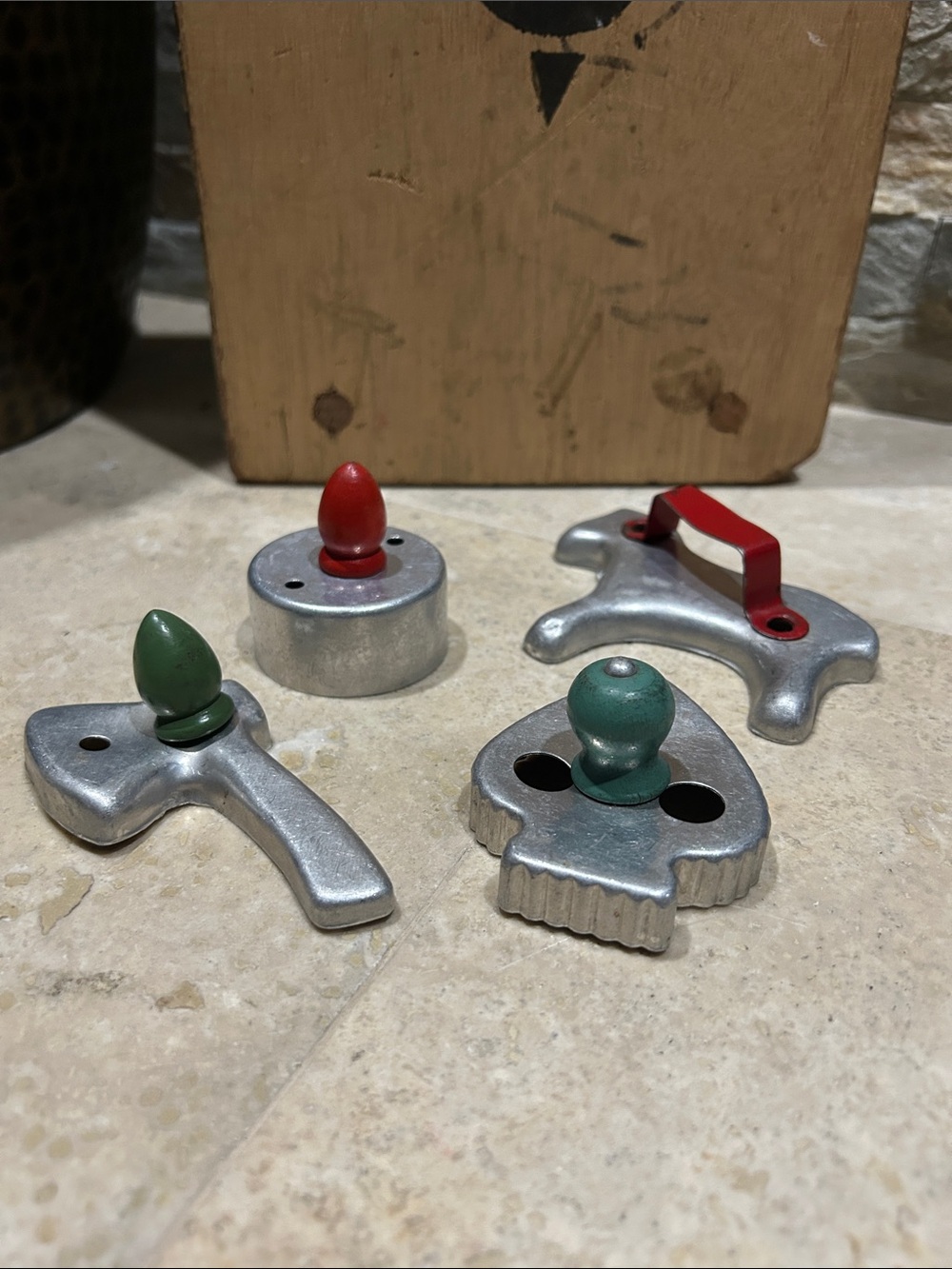 vintage MCM aluminum cookie or canapé cutters and a biscuit or doughnut cutter